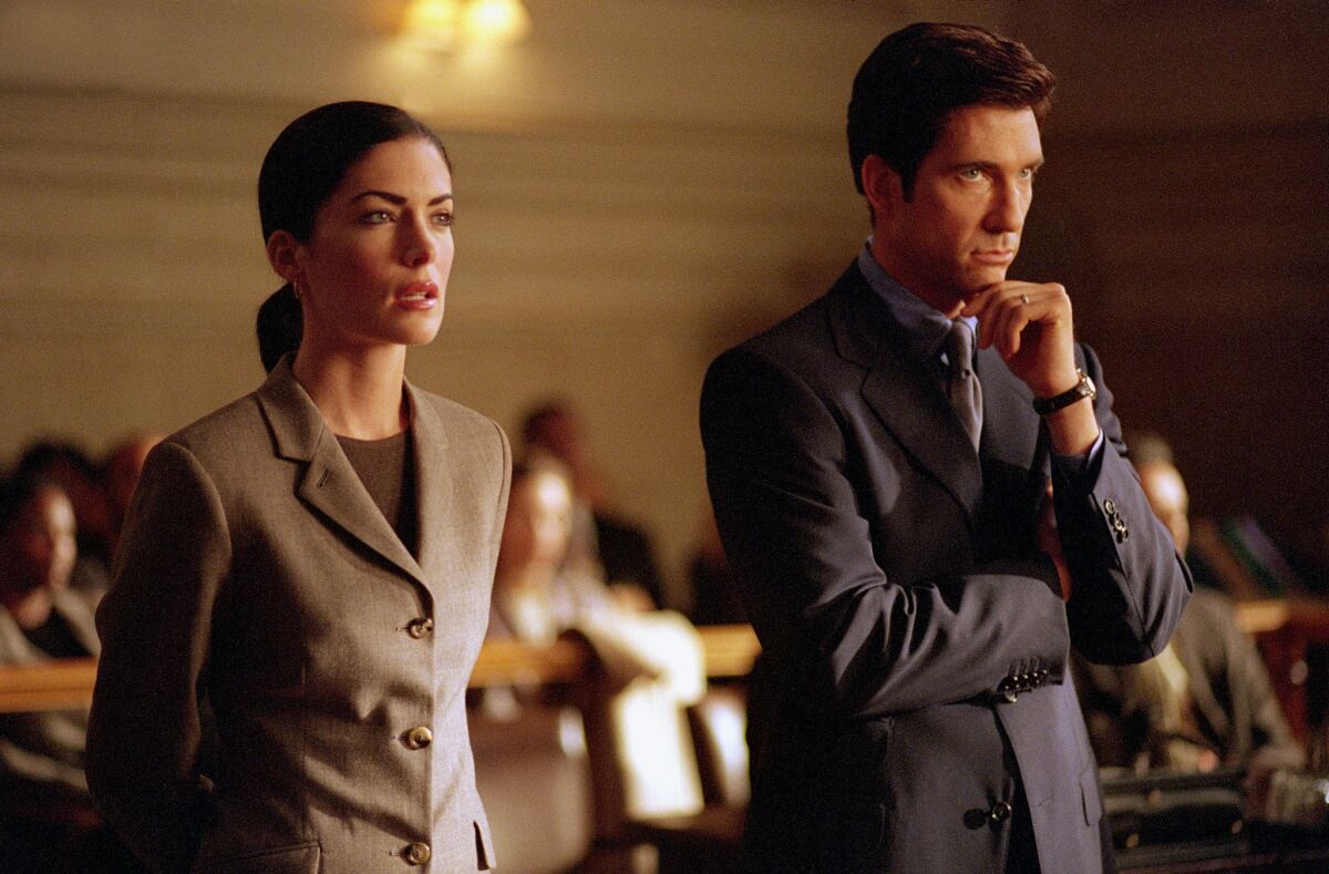 Dylan McDermott as Bobby Donnell and Lara Flynn Boyle as Helen Gamble on "The Practice."