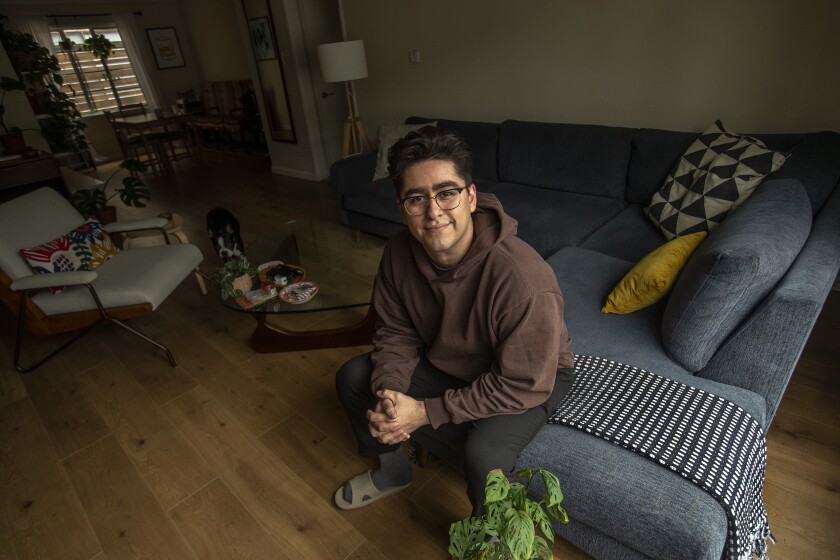 Jacob Guardado inside his two-bedroom apartment in Studio City.