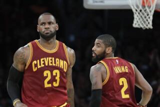 Cleveland Cavaliers' LeBron James, left, and Kyrie Irving play the Los Angeles Lakers in 2016.