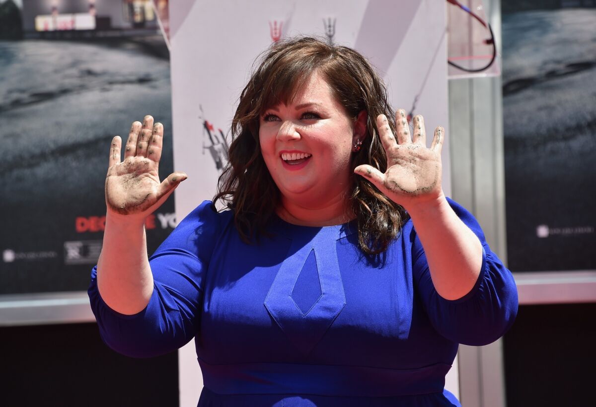 Melissa McCarthy leaves her handprints in front of the TCL Chinese Theatre, earlier this month on July 2, 2014.