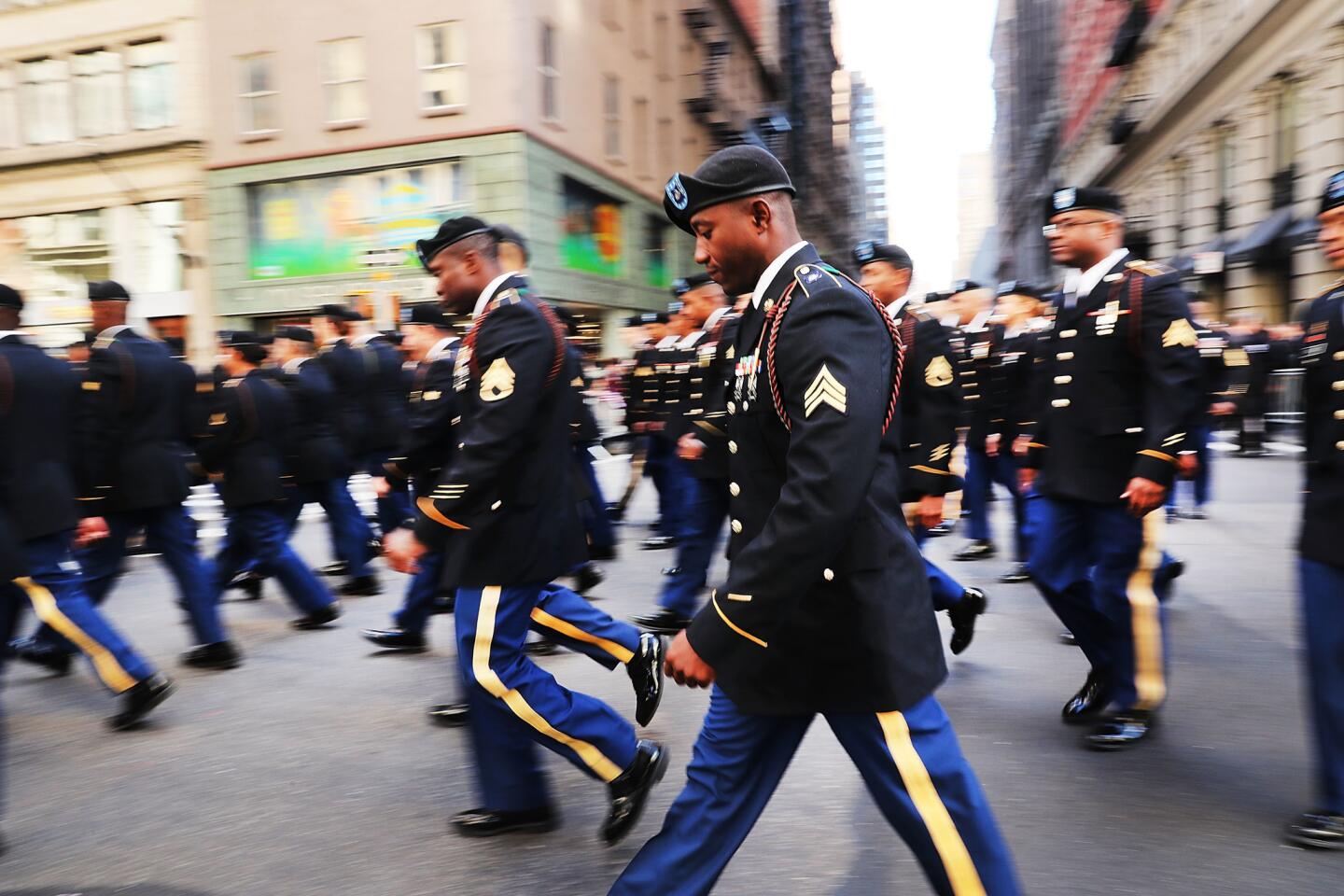 Members of the Army march in the nation's largest Veterans Day parade in New York City. Known as America's Parade, it features more than 20,000 participants, including veterans, military units, businesses, high school bands and civic and youth groups.