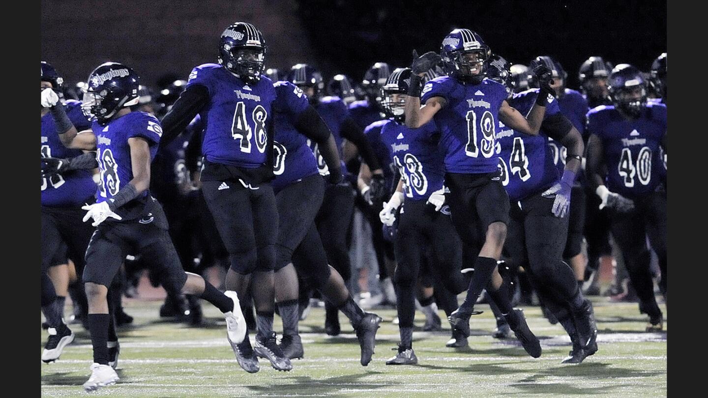 Photo Gallery: St. Francis vs. Cathedral in an Angelus League football game