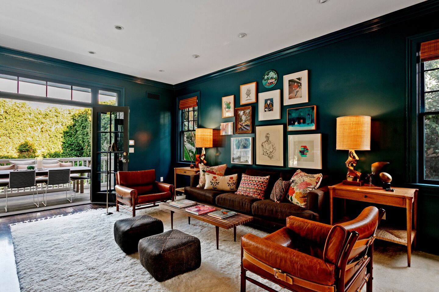 The family room adds a bold splash of turquoise.