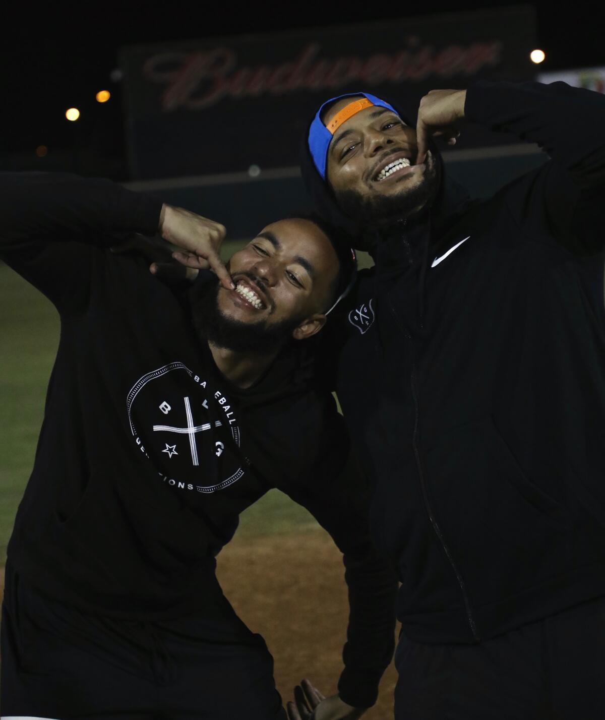 J.P. Crawford, left, and Dominic Smith have some fun at a recent Baseball Generations All-Star Game.