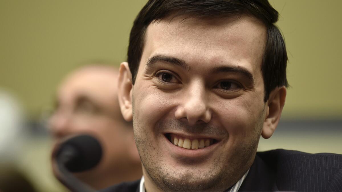 Martin Shkreli smiles on Capitol Hill during a 2016 congressional hearing