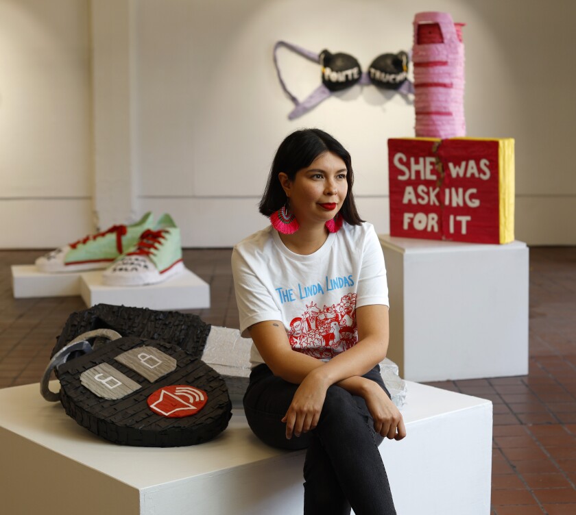 Diana Benavidez in the Athenaeum Art Center gallery.