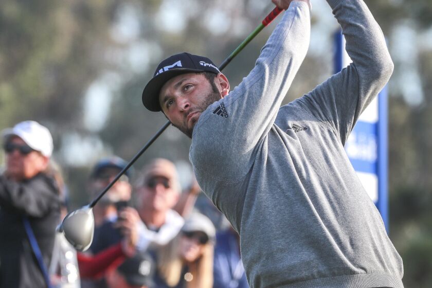 Jon Rahm hits a drive from the 18th tee of the South Course during the third round of the Farmers Insurance Open at the Torrey Pines Golf Course on Saturday, January 25, 2020 in La Jolla, California.