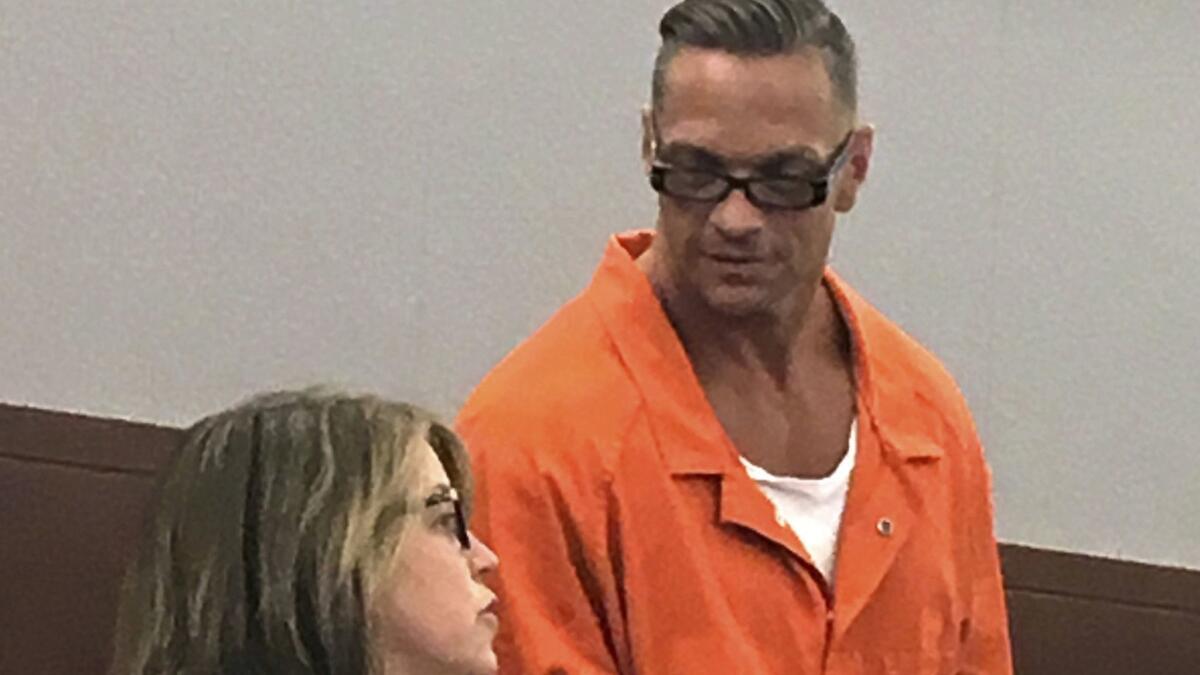 Nevada death row inmate Scott Dozier with Lori Teicher, a federal public defender, in 2017.