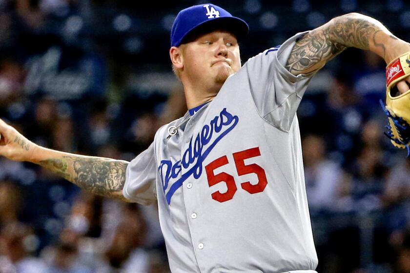 Dodgers starter Mat Latos gave up eight hits and four runs in four innings Thursday night against the Padres in San Diego.