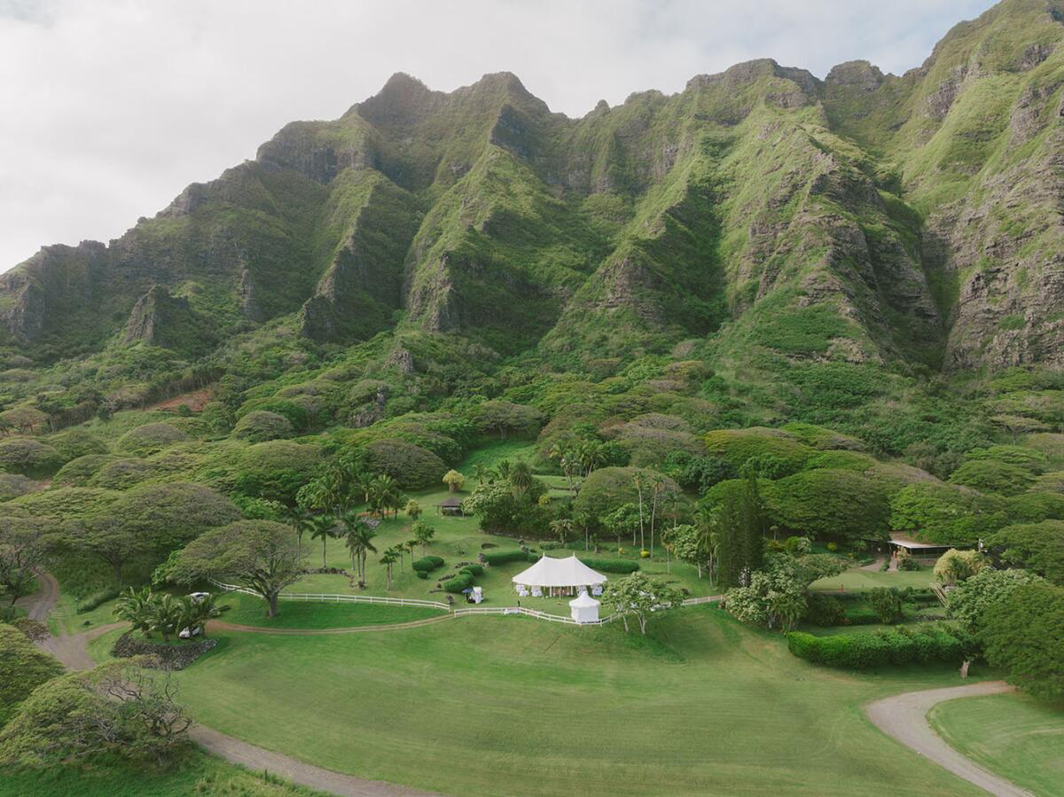 A tent nestled mountainside at Kualoa Ranch.