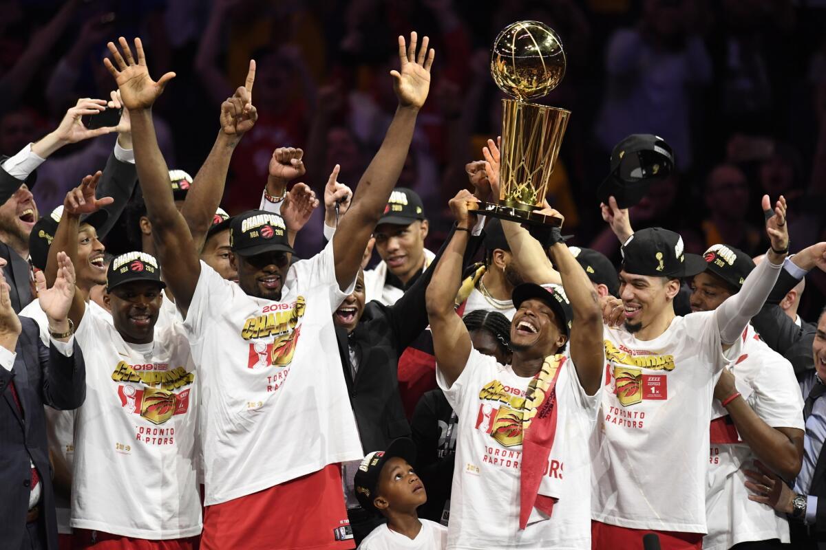 The Toronto Raptors celebrates win over the Golden State Warriors in Game 6 to win the NBA championship on Thursday in Oakland.