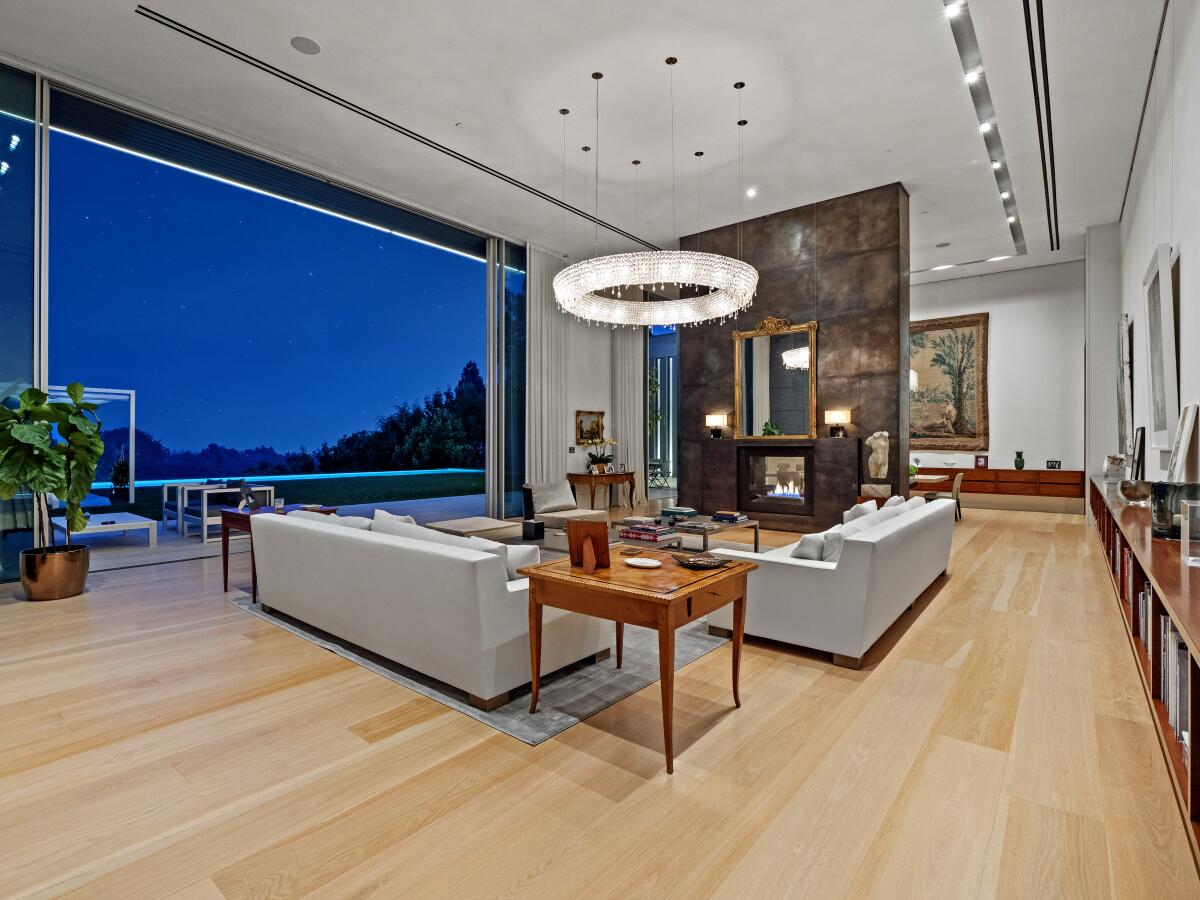 This contemporary Home of the Week sits above Bel-Air Country Club, taking in golf course and city views.