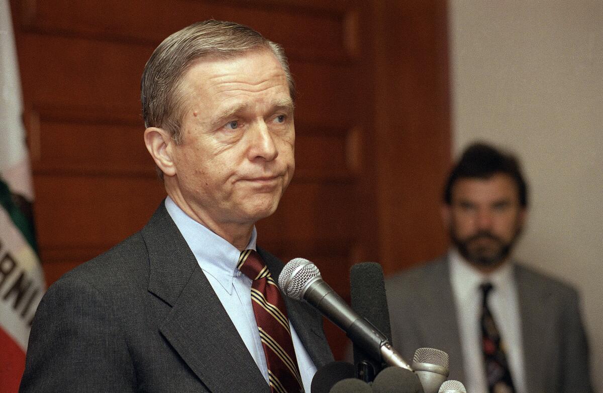 Then-Gov. Pete Wilson listens to a question during a news conference in Los Angeles in 1992.