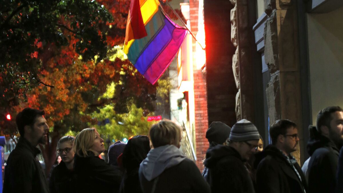 People wait to get into an event supporting gay and lesbian families on Nov. 9 in Salt Lake City.