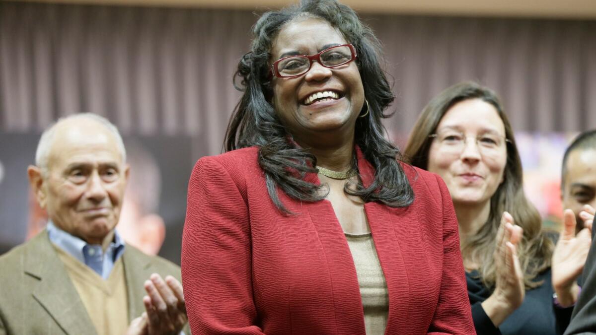 Happier times: A beaming King is named leader of Los Angeles Unified in Jan. 2016. She's flanked by retiring Supt. Ramon Cortines and then-board member Monica Ratliff.