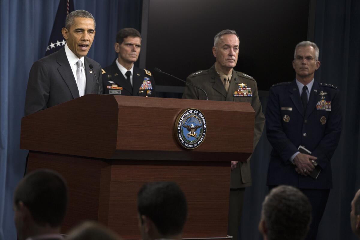President Obama speaks at the Pentagon following a National Security Council meeting in December. Also pictured are (from L-R) Commander of U.S. Special Operations Command Gen. Joseph Votel, Joint Chiefs Chairman Gen. Joseph Dunford, and Joint Chiefs Vice Chairman Gen. Paul Selva.