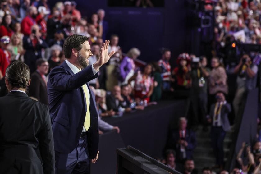 Milwaukee, Wisconsin, Tuesday, July 16, 2024 - Vice Presidential nominee J.D. Vance greets delegates during day two of the Republican National Convention at Fiserv Forum. (Robert Gauthier/Los Angeles Times)