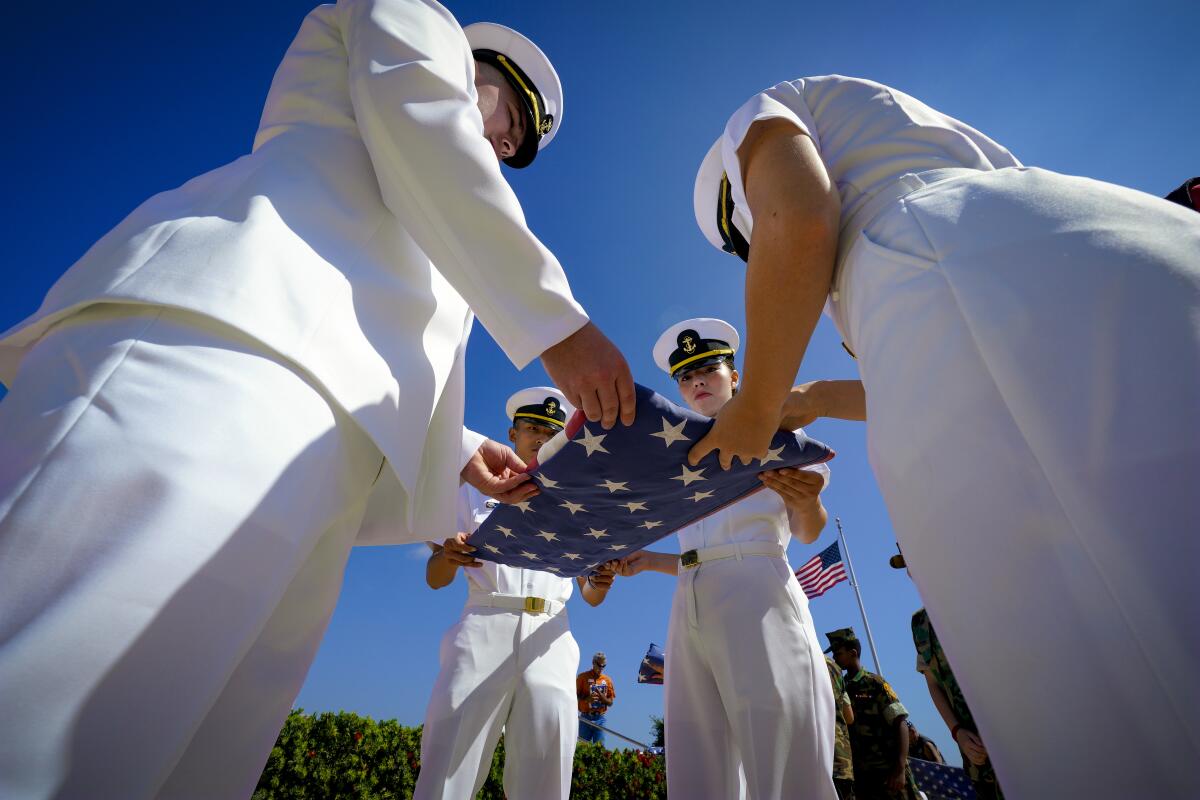 Volunteers made up of active duty sailors, ROTC and Patriot Guard Riders took part in folding 44 U.S. flags.