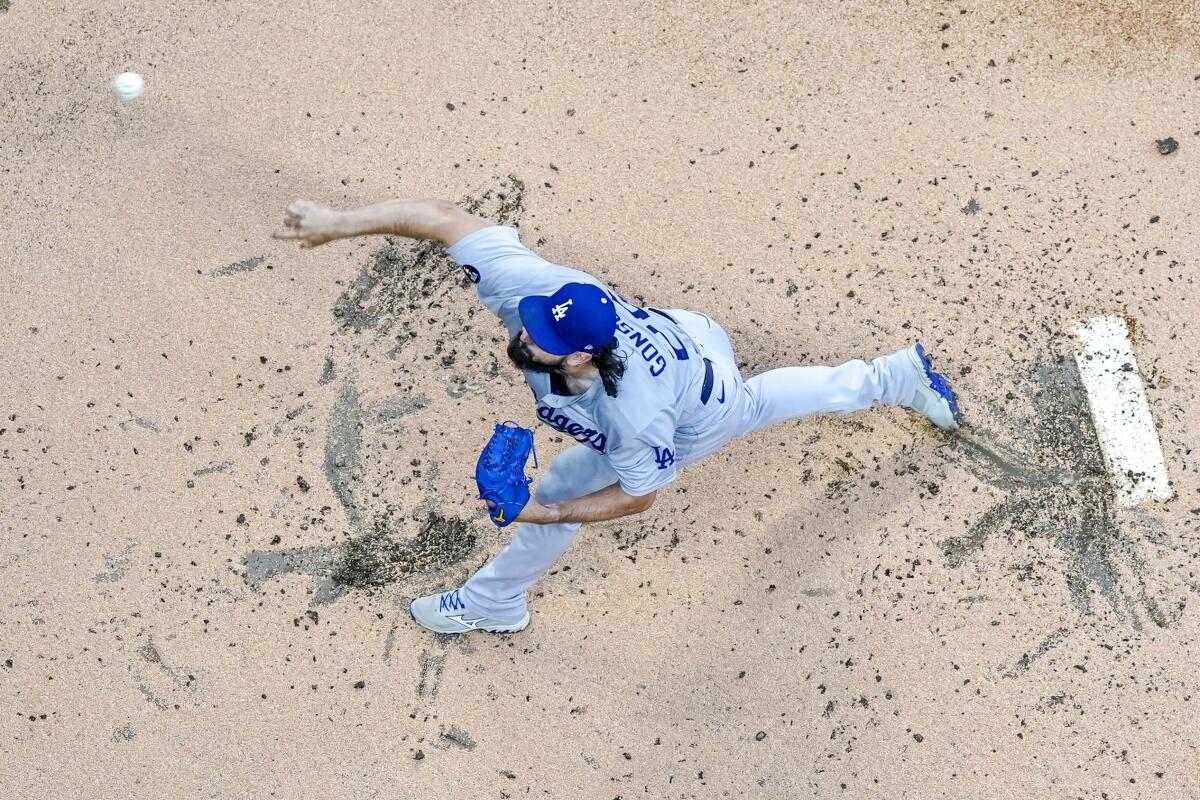 Dodgers starting pitcher Tony Gonsolin throws against the Milwaukee Brewers on Aug. 17.