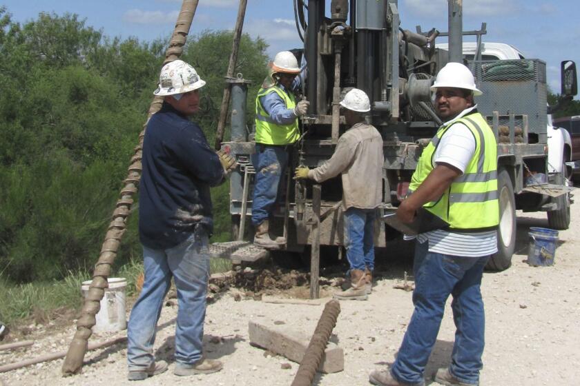 A crew uses a drilling rig to extract soil samples from an existing earthen levee at Santa Ana Wildlife Refuge in the Rio Grande Valley. Last week, the U.S. Army Corps of Engineers used a drilling rig to extract soil samples from an existing earthen levee at Santa Ana Wildlife Refuge in the Rio Grande Valley to prepare for the possibility of constructing a concrete levee wall and fence, a federal official said.