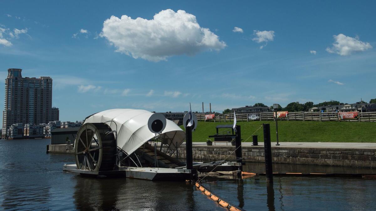 This water wheel in Baltimore’s Inner Harbor, known as "Mr. Trash Wheel," is an example of the sort of trash-collecting vessel planned for Upper Newport Bay.