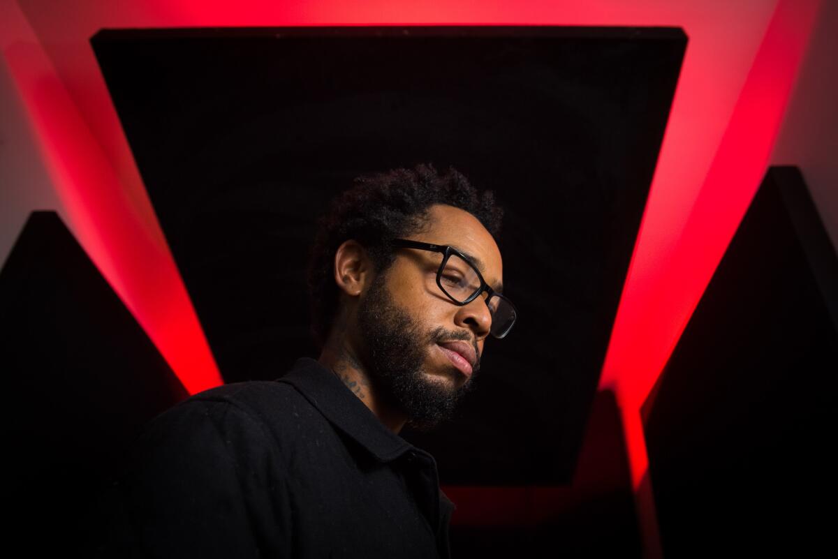 Terrace Martin stands in a recording booth at "The Sound of Crenshaw Ranch."