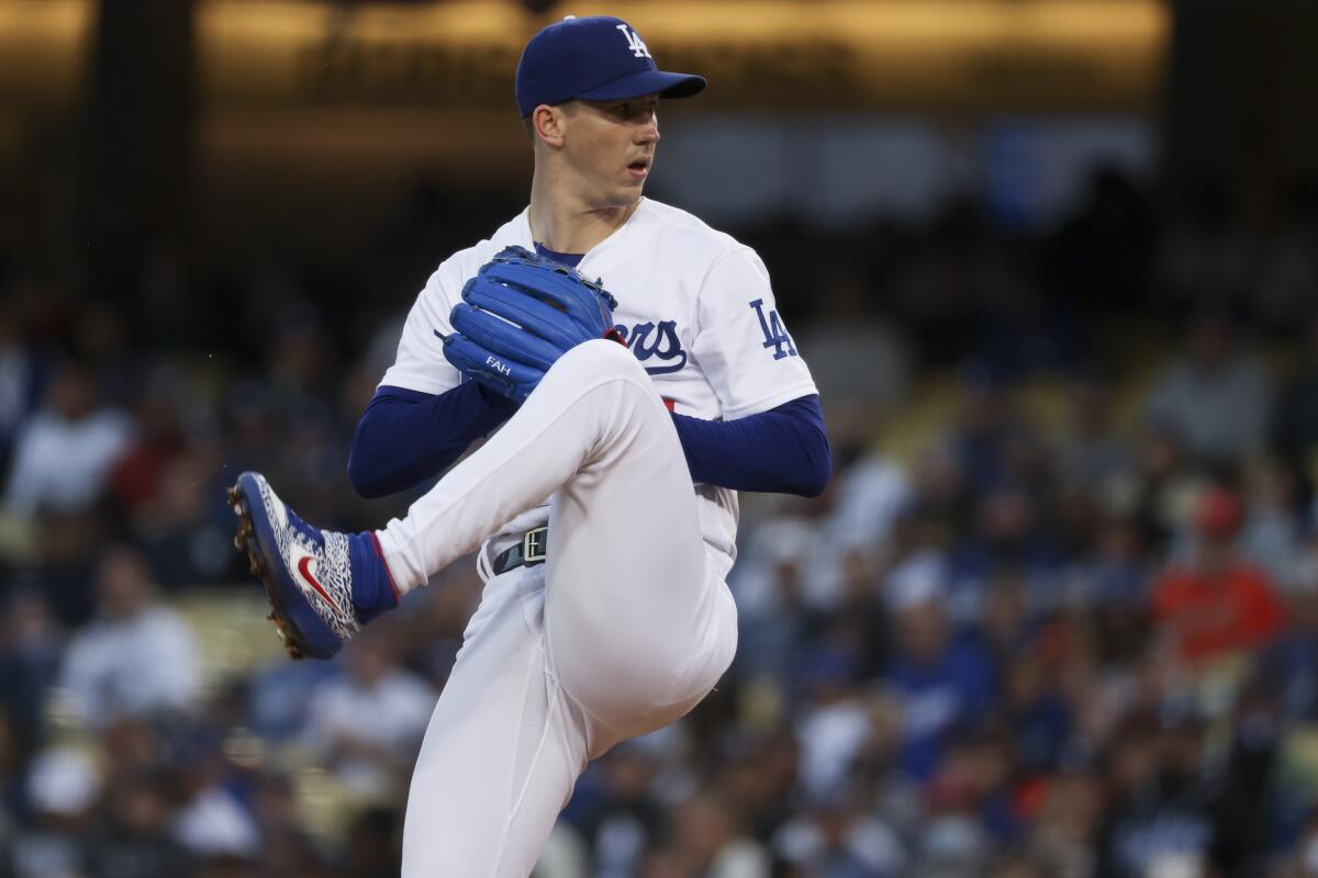 Dodgers pitcher Walker Buehler delivers in the first inning of Game 4.