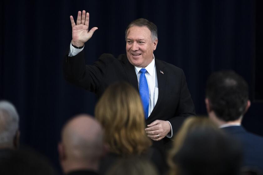 Secretary of State Mike Pompeo departs after delivering remarks on human rights in Iran at the State Department in Washington, Thursday, Dec. 19, 2019. (AP Photo/Matt Rourke)