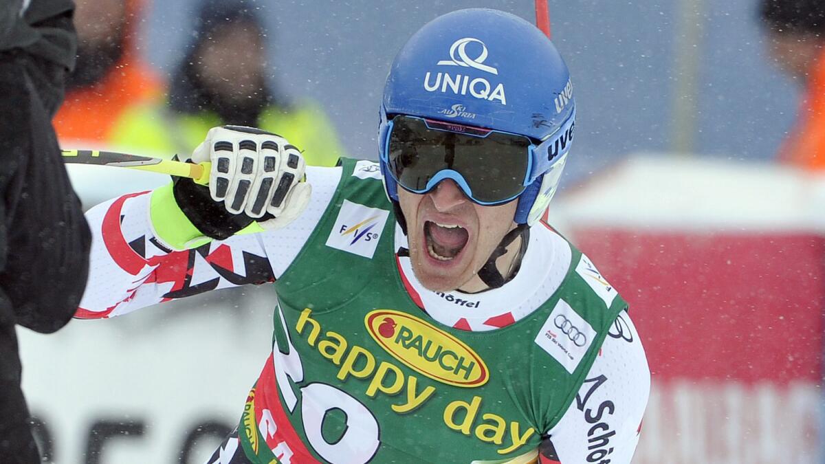 Matthias Mayer reacts after crossing the finish line during the men's World Cup super-G race in Austria on Sunday.