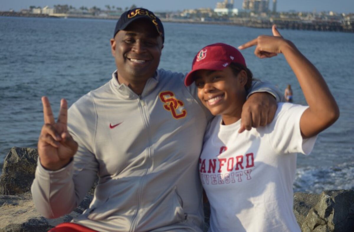 Former USC and NBA player Harold Miner with his daughter Kami, a Stanford-bound senior volleyball player at Redondo Union.