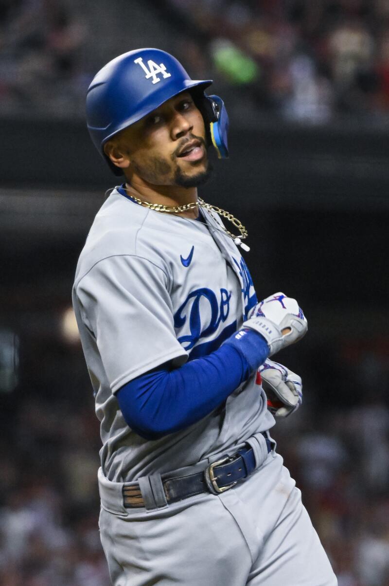 Dodgers star Mookie Betts runs back to the dugout after an out in Game 3 of the NLDS.