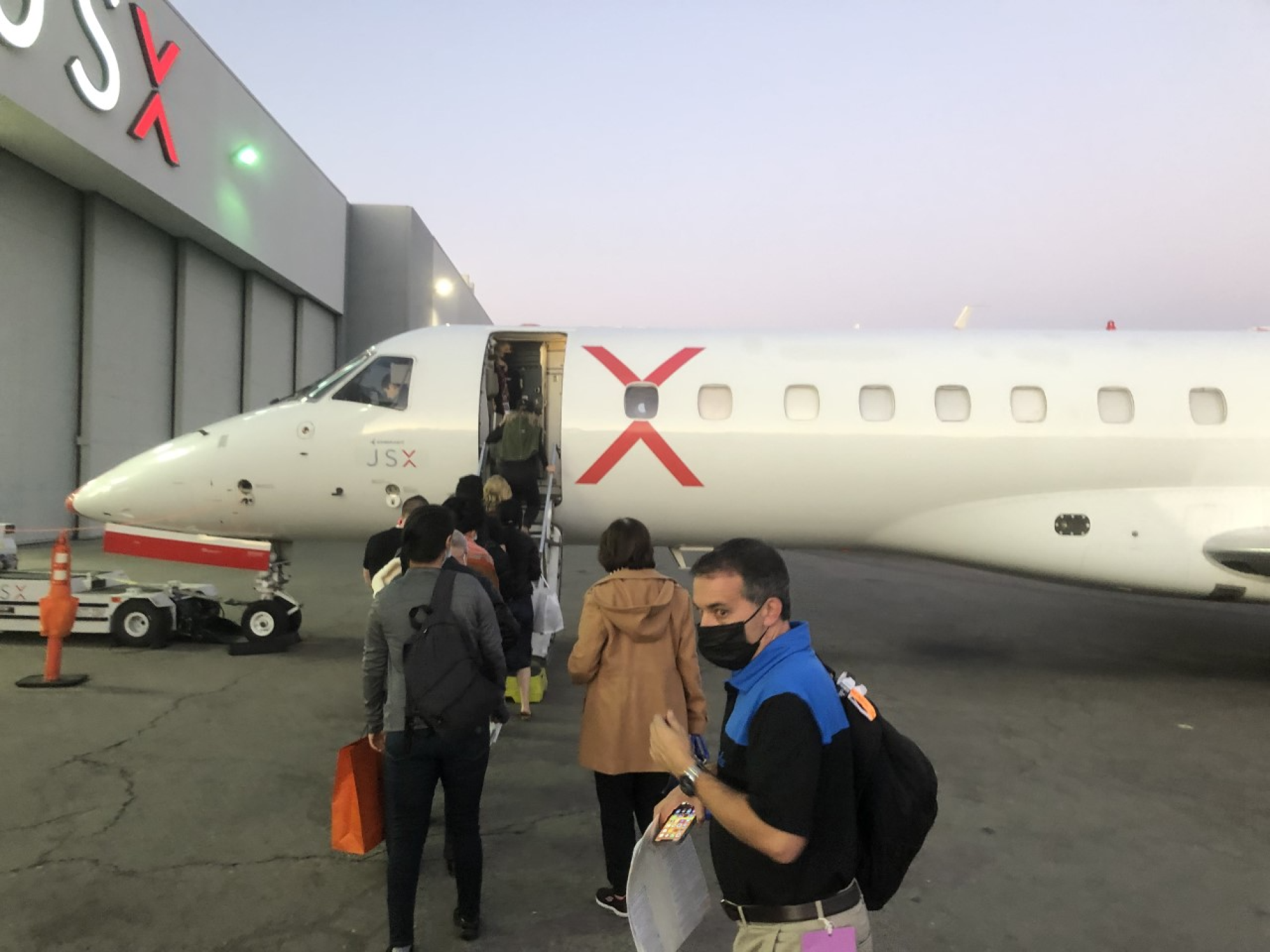 Josh Lewin waits in line at 4:45 p.m. to board the JetBlue JSX flight bound for Burbank.