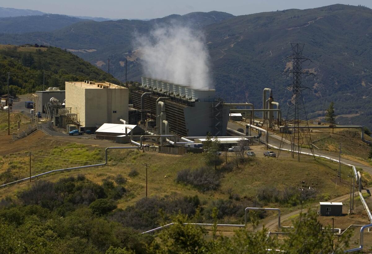 Steam rises from cooling towers from one of the geothermal power plants at Calpine's geothermal facility near Middletown, Calif., seen in a 2007 file photo.
