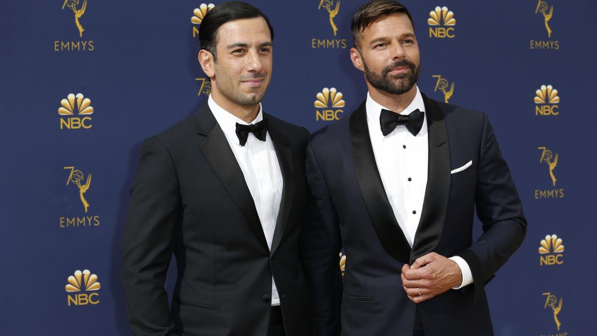 Ricky Martin, right, and husband Jwan Yosef have welcomed a baby girl.