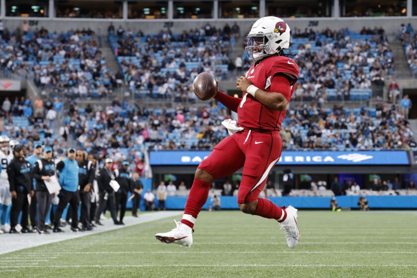 Arizona Cardinals quarterback Kyler Murray (1) runs for a touchdown against the Carolina Panthers during an NFL football game in Charlotte, N.C., Sunday, Oct. 2, 2022. (AP Photo/Nell Redmond)