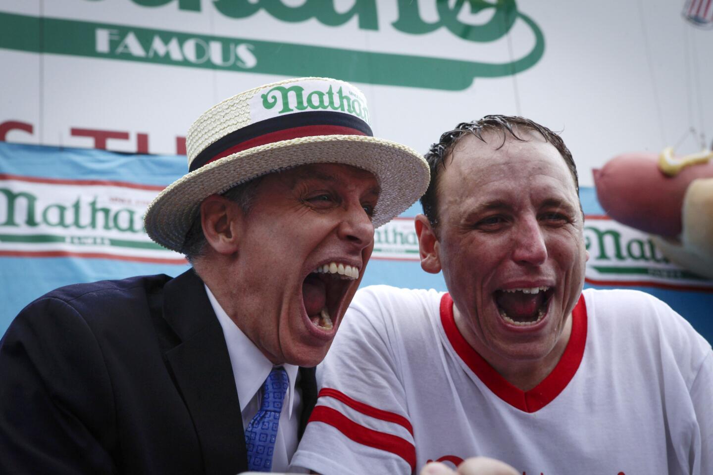 Joey Chestnut and George Shea