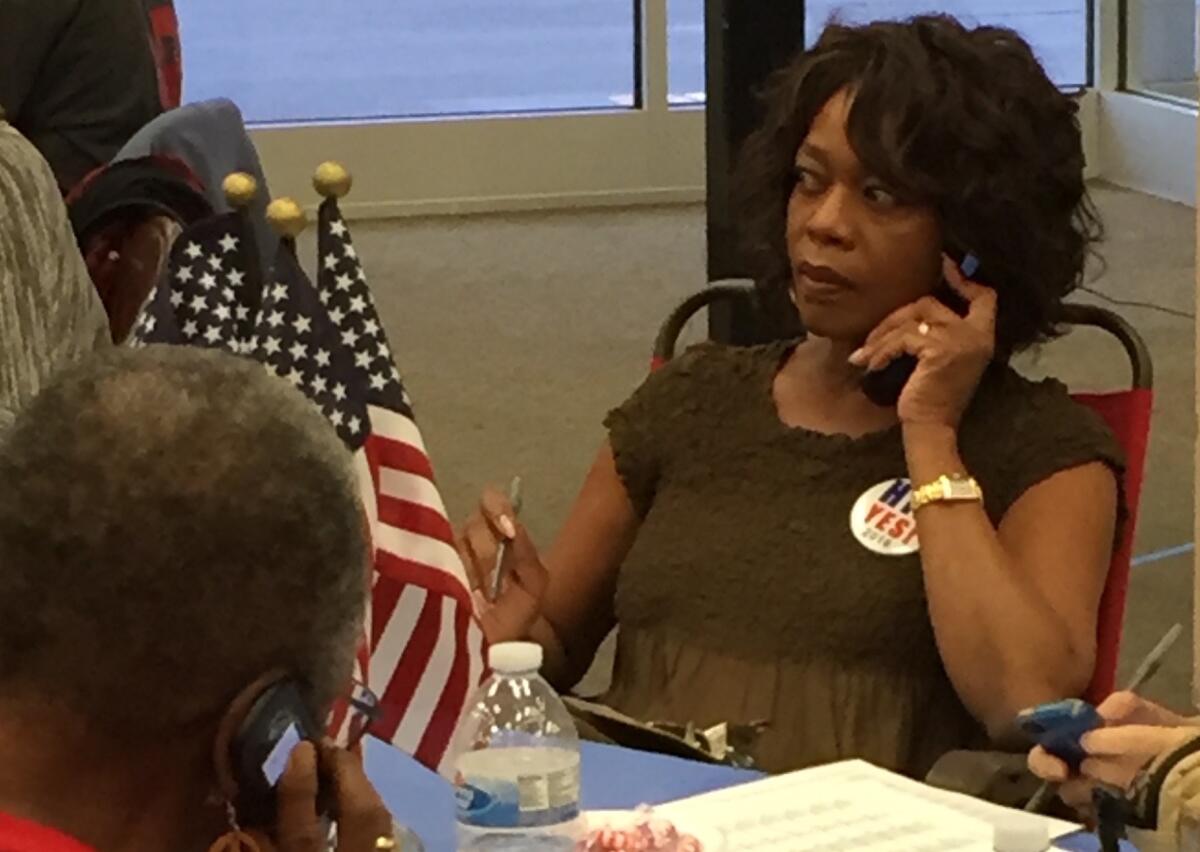 Alfre Woodard cold-calls voters from a Hillary Clinton campaign office in west Philadelphia.