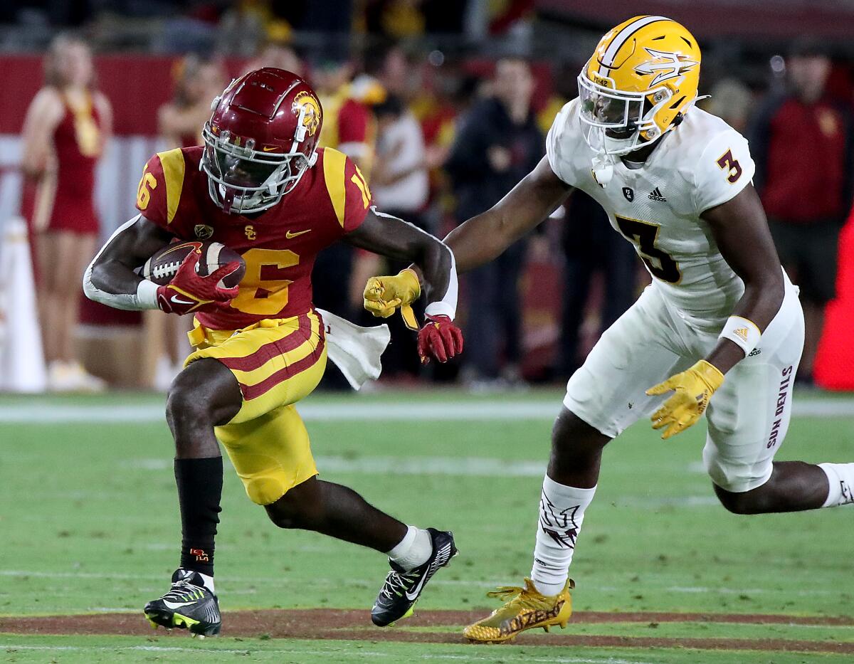 USC wide receiver Tahj Washington makes a reception against Arizona State on Oct. 1.