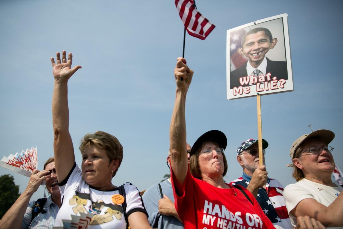 Tea party activists cheer during the "Exempt America from Obamacare" rally Sept. 10 on Capitol Hill.
