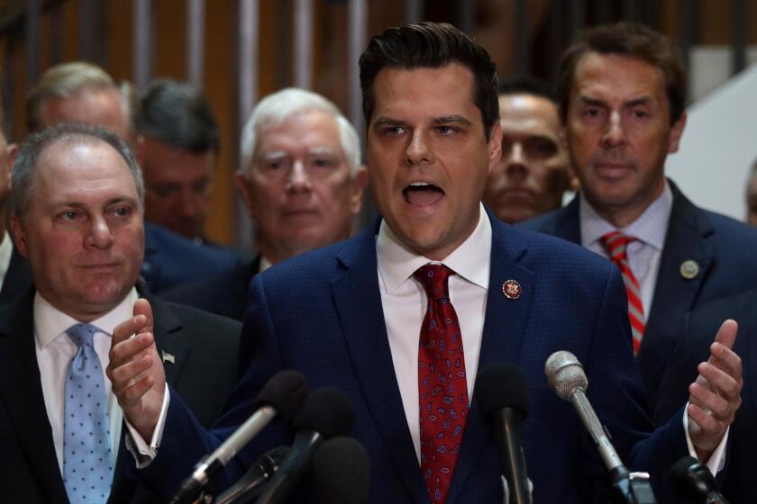 WASHINGTON, DC - OCTOBER 23: Flanked by about two dozen House Republicans, U.S. Rep. Matt Gaetz (R-FL) speaks as House Minority Whip Rep. Steve Scalise (R-LA) (L) listens during a press conference at the U.S. October 23, 2019 in Washington, DC. Rep. Gaetz held the press conference to call for transparency in impeachment inquiry. (Photo by Alex Wong/Getty Images) ** OUTS - ELSENT, FPG, CM - OUTS * NM, PH, VA if sourced by CT, LA or MoD **