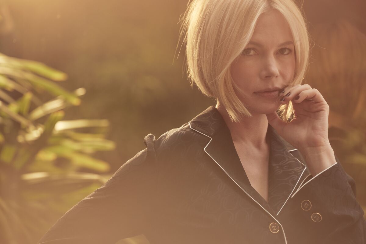 Michelle Williams poses for a portrait in the "magic hour" sunlight.