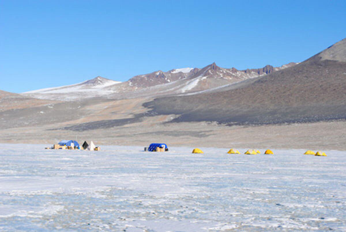 Lake Vida, an Antarctic lake sealed under 50 feet of ice, is nonetheless teeming with bacteria, according to a new study. Above, the researchers' field camp at Lake Vida during the study.