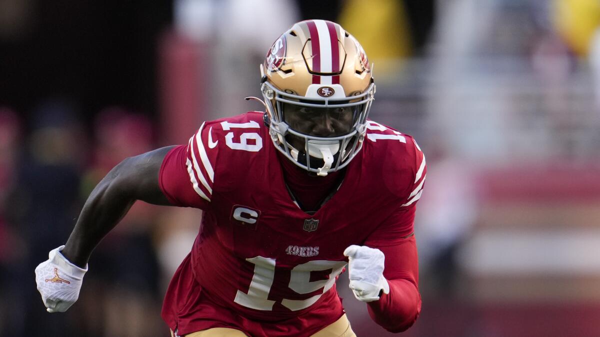 San Francisco 49ers wide receiver Deebo Samuel starts to run a route.