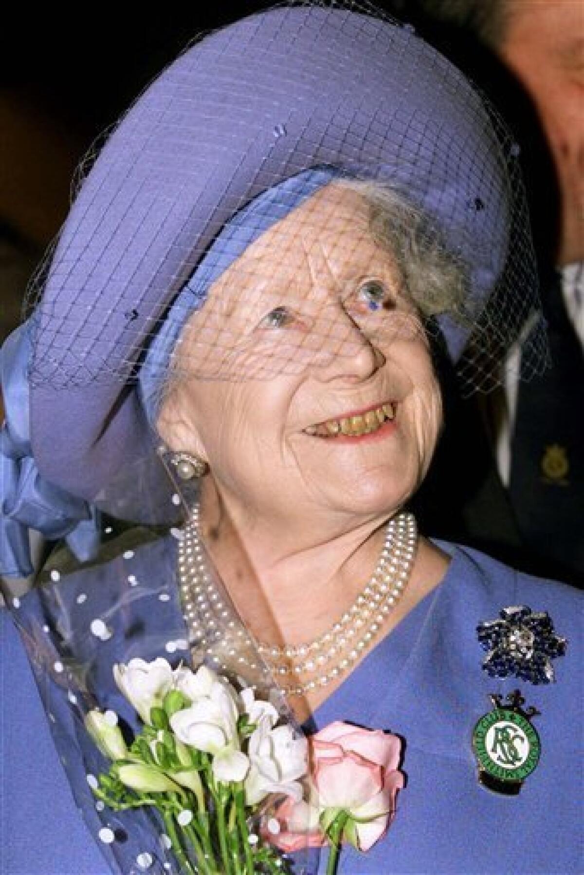 FILE - In this Dec. 1, 1998 file photo. Britain's Queen Elizabeth, the Queen Mother, reacts, during the Royal Smithfield Show in London, England. She was known for much of her life as the queen mother. And according to her official biography, she detested it. Horrible name," she wrote in a 1953 letter to her daughter, Queen Elizabeth II. (AP Photo/Kevin Lamarque, File)