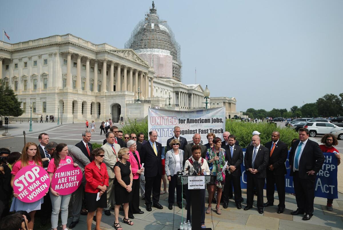 Rep. Barbara Lee (D-Oakland) and fellow Democratic members of Congress hold a news conference with labor, envirnonmental and human rights leaders to voice their opposition to the Trans-Pacific Partnership trade deal at the U.S. Capitol on June 10.