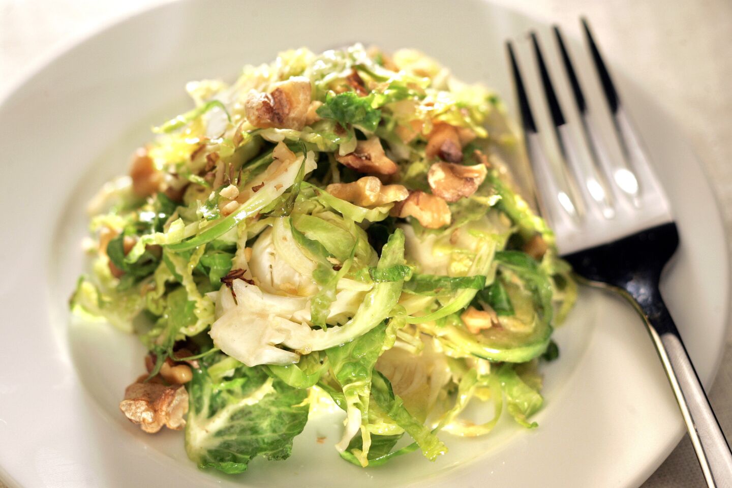 Gentle heating brings out Brussels sprouts' sweet flavor. Recipe: Wilted Brussels sprouts with walnuts