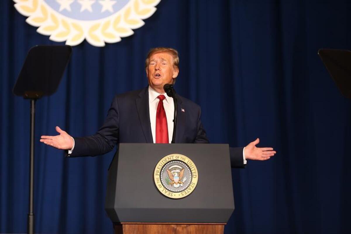 US President Donald J. Trump speaks to the audience at the American Veterans of Foreign Wars National Convention at the Galt House in Louisville, KY, USA, 21 August 2019. EFE/EPA/Mark Lyons