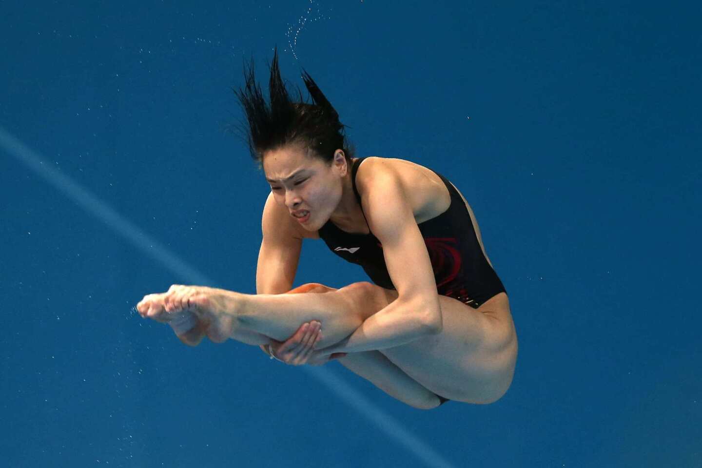 Wu Minxia of China competes in the women's 3-meter springboard diving final at the Aquatics Center. She earned the gold medal.