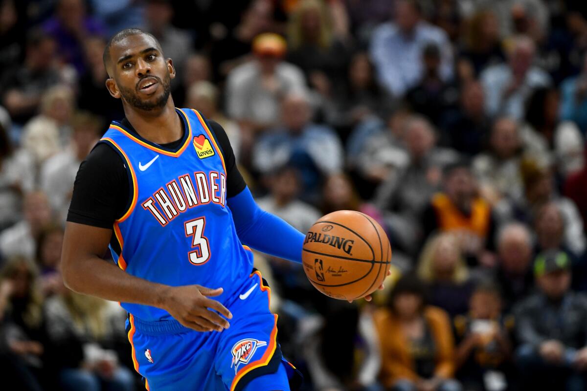 Thunder point guard Chris Paul brings the ball up court during a game earlier this season.