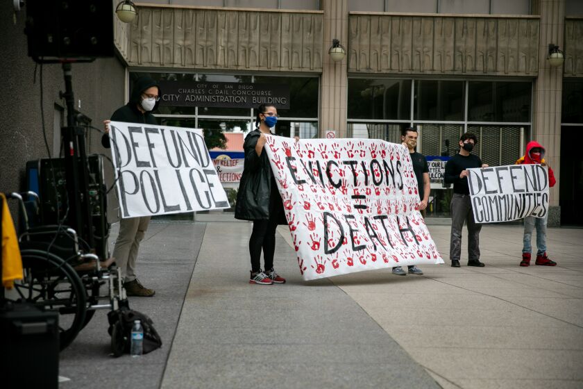 Protestors held a press conference outside San Diego City Hall demanding that the City Council vote to extend the eviction moratorium amidst the fallout from the coronavirus pandemic on June 30, 2020 in San Diego, California.